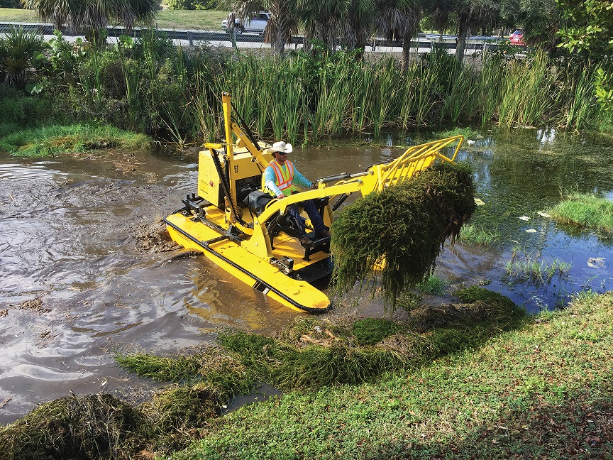 Weedooboats - waterways machine clearing weeds